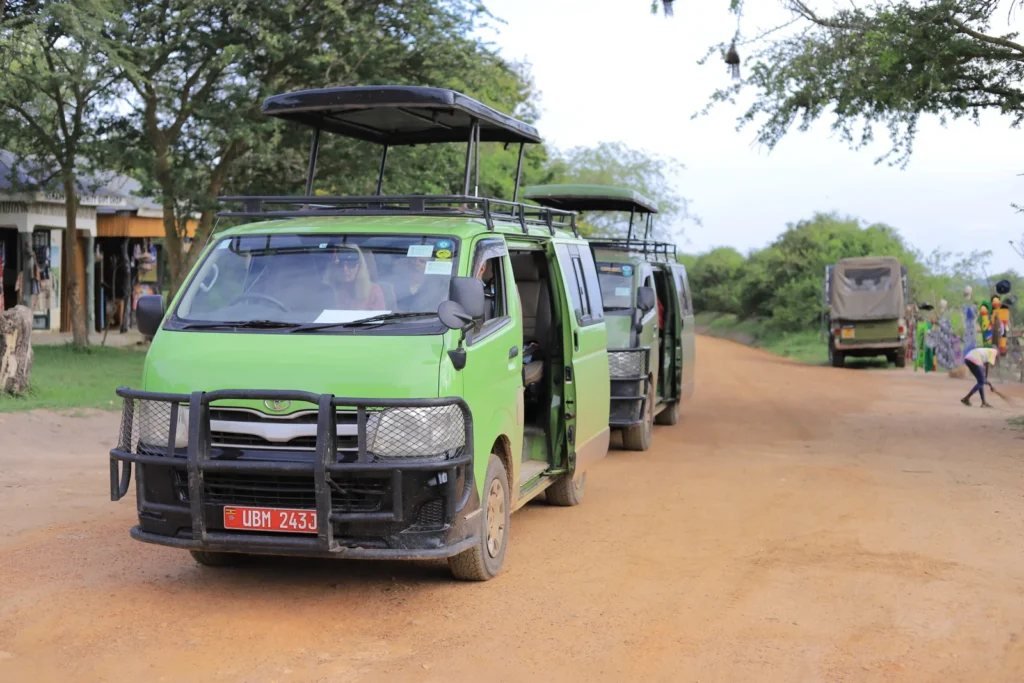 Two green Bashem vans on a track