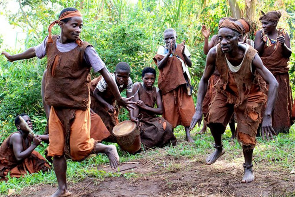Batwa people performing in the forest they once lived in