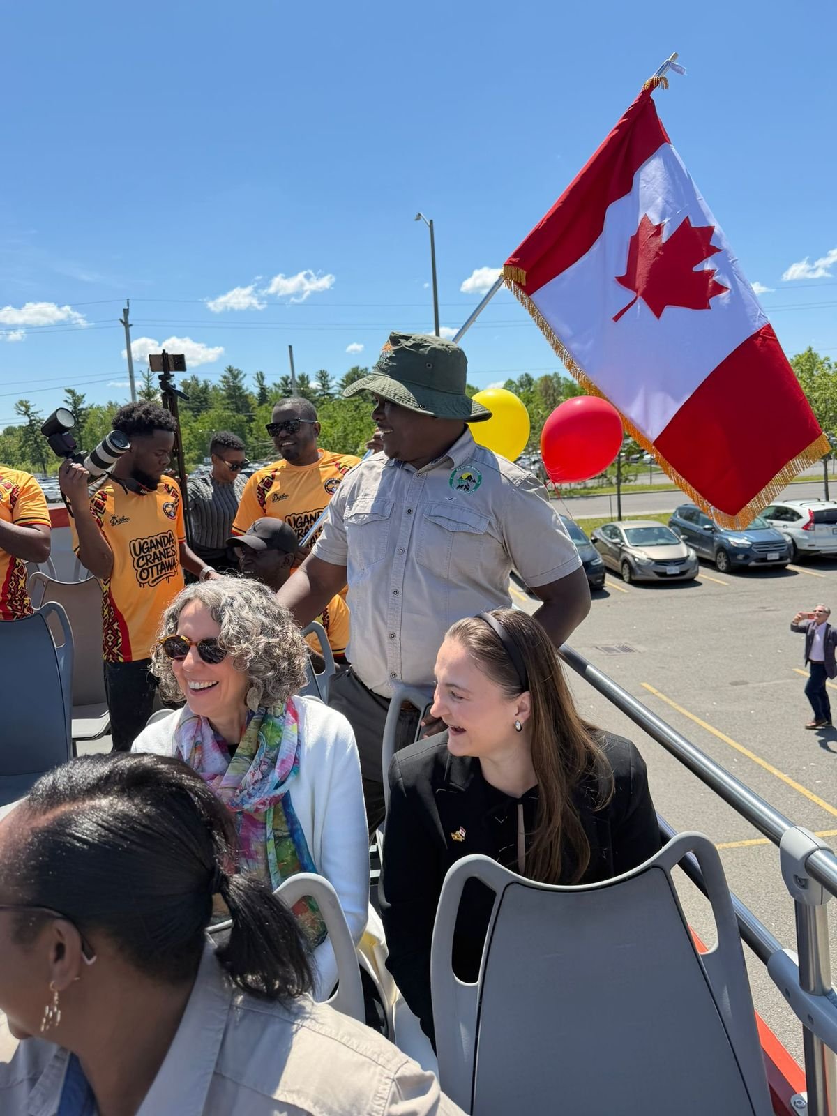 Bashem guests and team with the Canadian flag at an Ottawa event