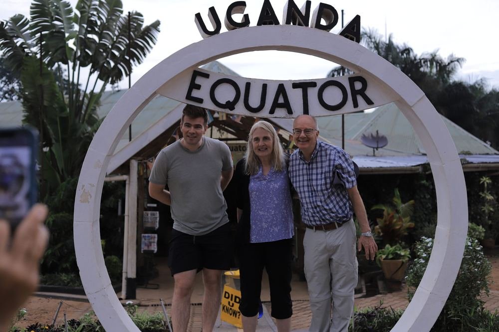 Travellers at the Uganda Equator monument